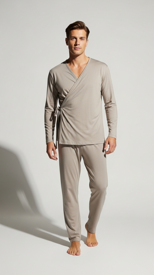 Man wearing a beige loungewear set on a white background