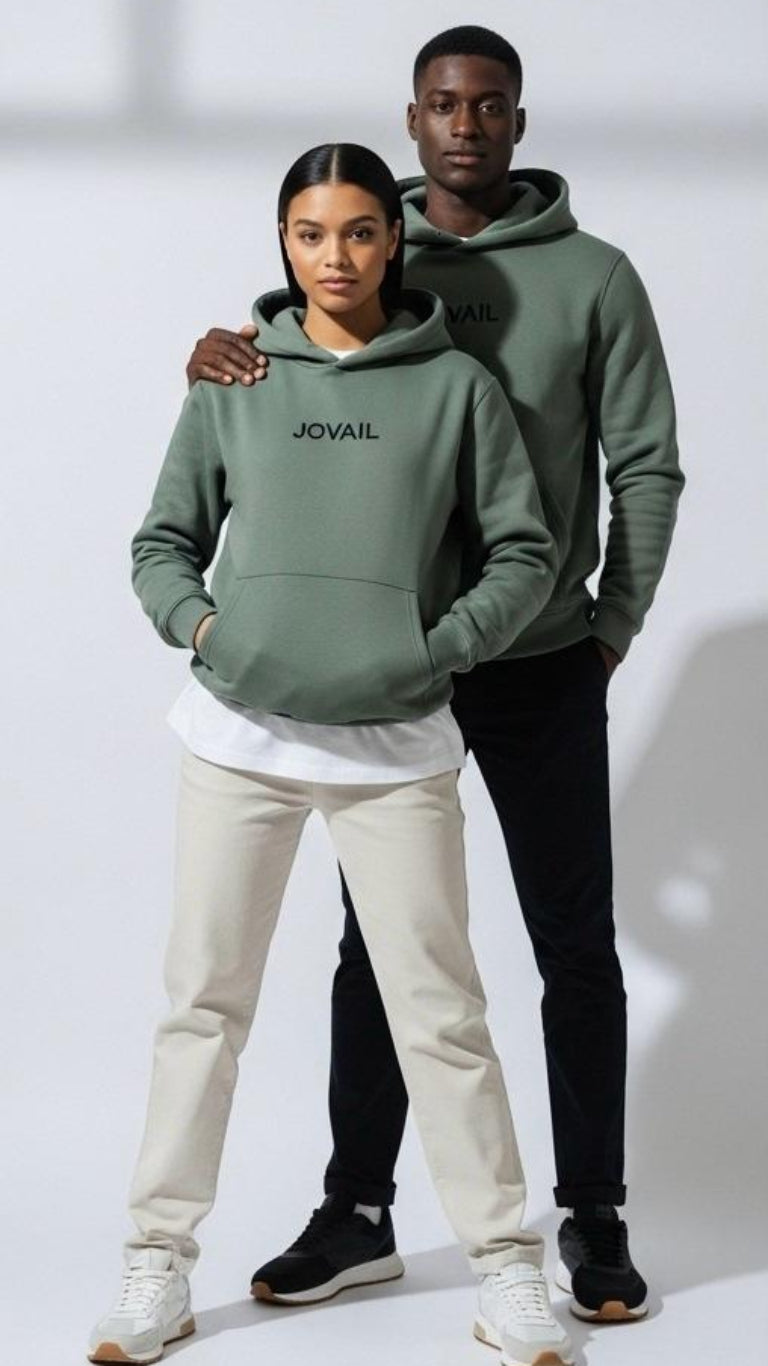 Two people wearing green 'JOYAIL' hoodies on a white background