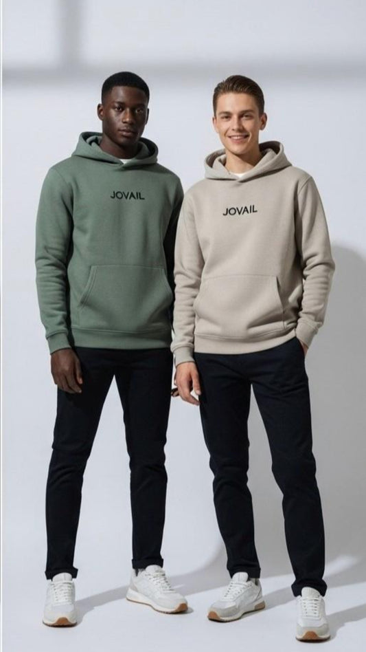 Two people wearing Jovial hoodies and pants on a white background